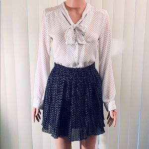 Navy & white polka dot skirt & blouse set.